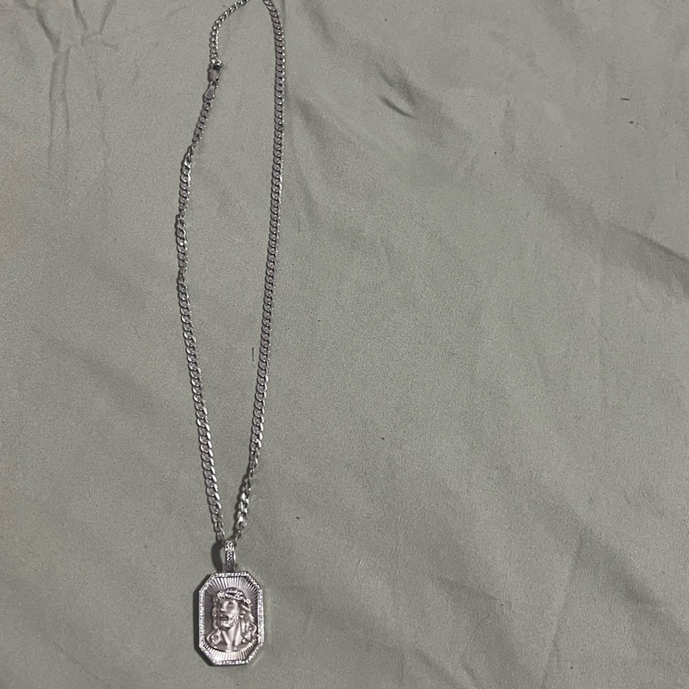 Silver Christ Pendant Necklace. .925silver Cuban link chain with pendant.